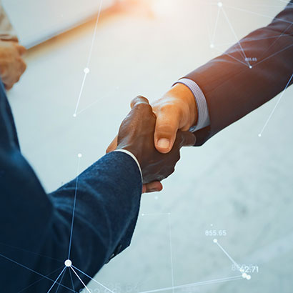 Two professionals shaking hands.